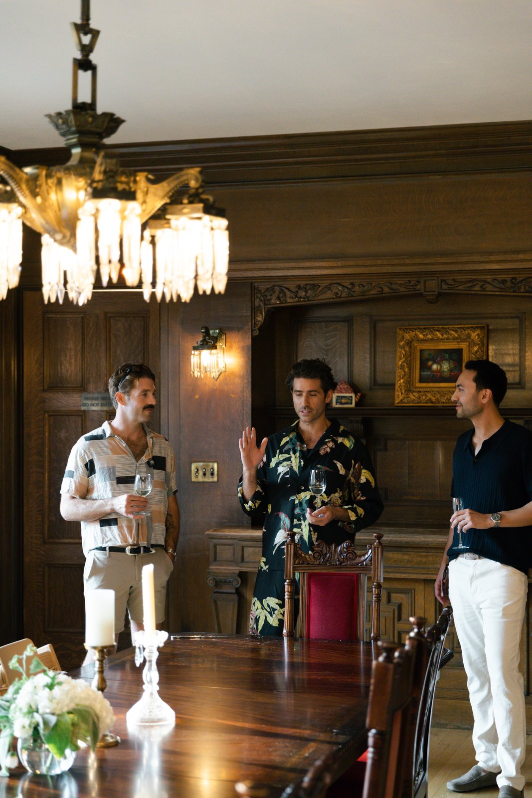 Guests in conversation in The Baillie's dining room